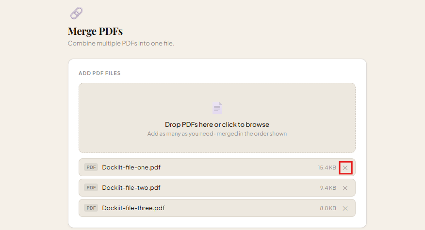 DocKiit merge tool with the X button highlighted for removing an incorrectly uploaded PDF file